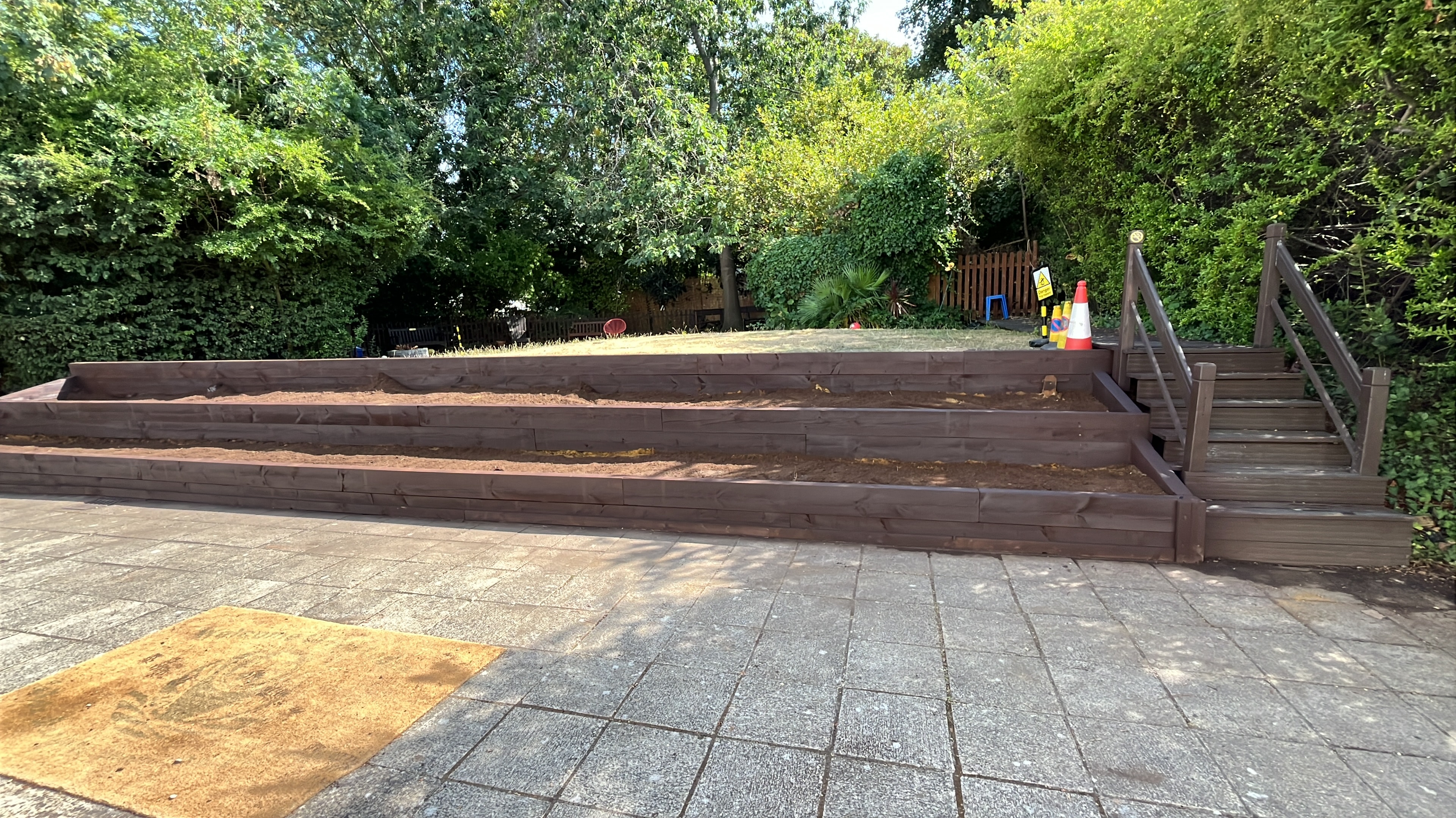 Completed timber raised garden beds with steps — West London